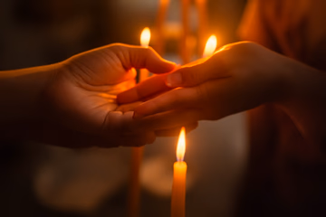 Candlelight illuminating a couple holding hands, symbolizing rekindled love in Chambéry.