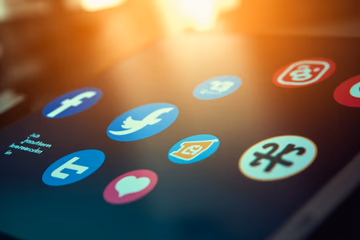 Website interface with social media icons, symbolizing SMM panel's role in boosting website traffic.