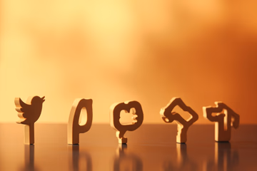 Social media icons rising, symbolizing enhanced online visibility through SMM panel services.