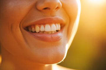 A bright, healthy smile representing the success of dental marketing for a dental trust.