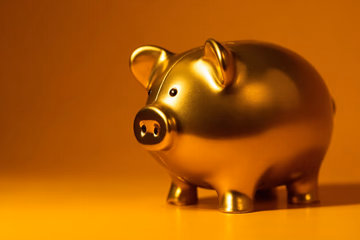 Golden piggy bank symbolizing tax optimization strategies for freelancers.
