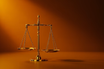 Golden balance scale symbolizing tax optimization for freelancers and self-employed individuals.